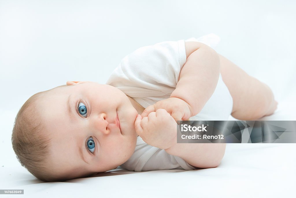 baby little, cute baby boy lying on white background Baby - Human Age Stock Photo