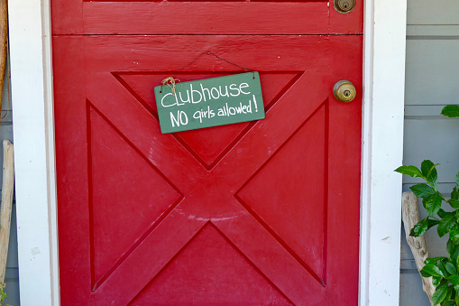 Red Dutch door with clubhouse sign