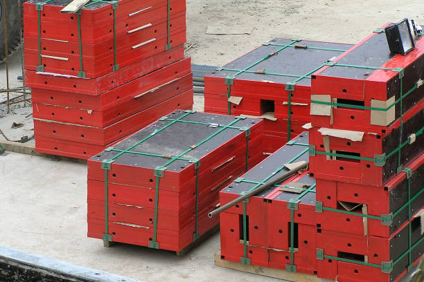 Painted panel board at the construction Painted panel board at the construction of a residential building concrete in formwork stock pictures, royalty-free photos & images