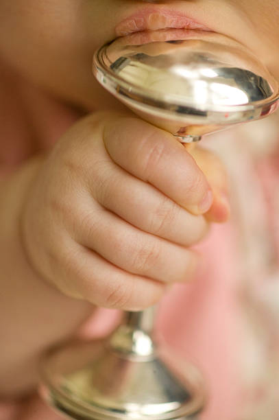 Baby with a rattle stock photo