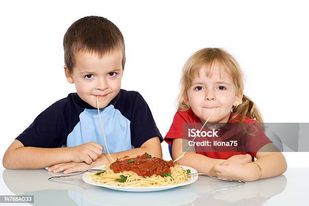 Kids Eating Pasta Stock Photo - Download Image Now - Beautiful People, Beauty, Boys