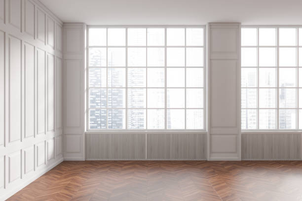 istock Stylish empty room interior, molding design and panoramic window on city view 1476544008