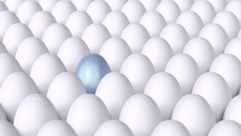 Blue Egg is Surrounded by Bunch of White Eggs in 4K Resolution