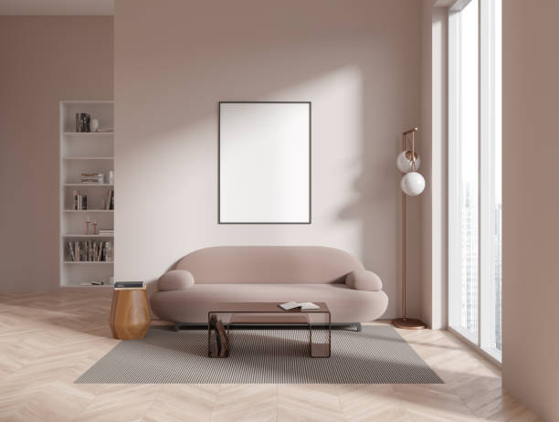 istock Beige living room with sofa, bookcase and poster 1476550134