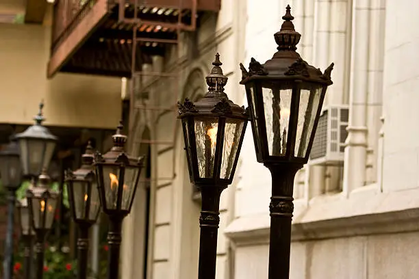row of old fashion gas lit street lamps in New York