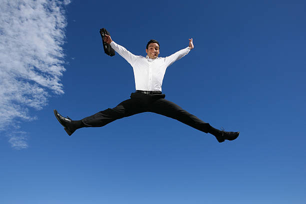 istock Businessman jumping in the air 147655752