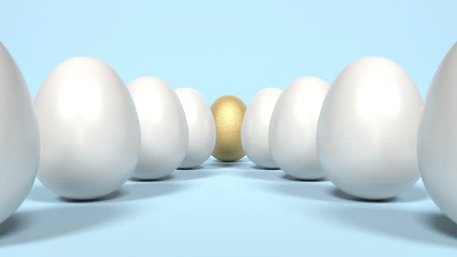 Golden Egg is Standing Out From White Eggs on Blue Background in 4K Resolution