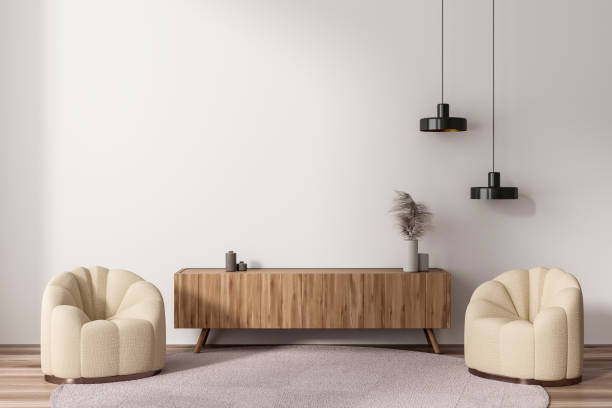 istock Stylish living room interior with two seats and sideboard. Mockup wall 1476560742