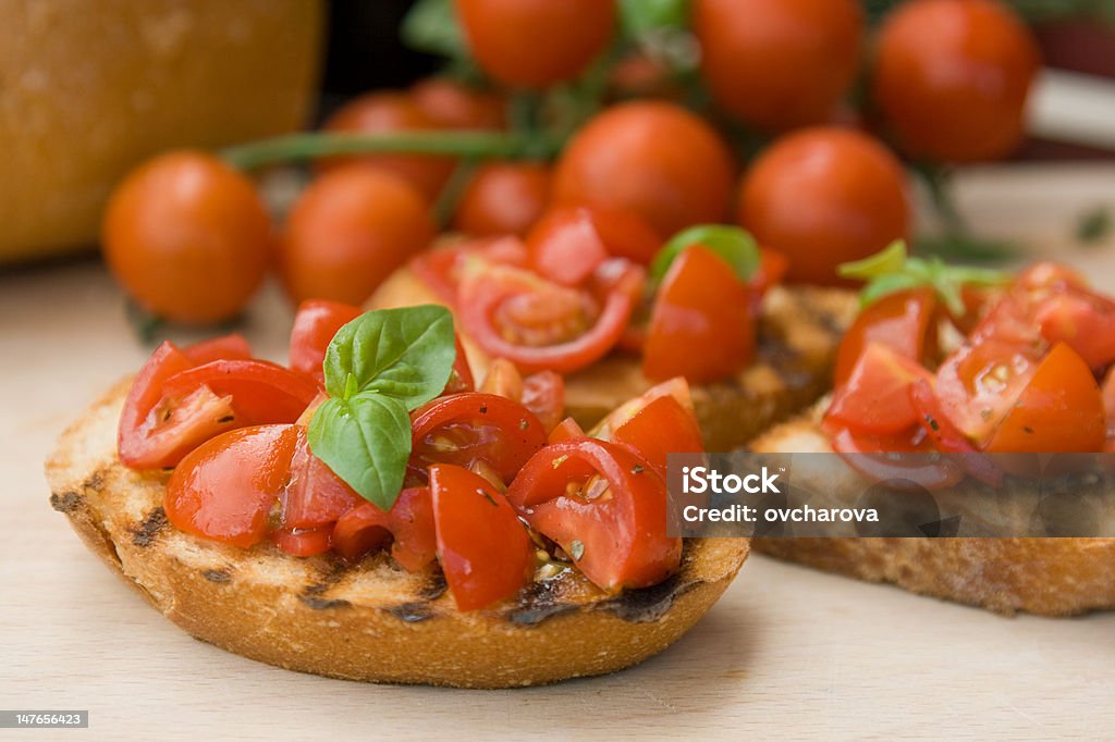 Pão torrado italiana com Tomate (Brusqueta - Royalty-free Antipasto Foto de stock