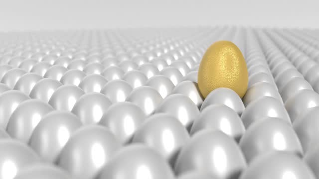 Golden Egg is Surrounded by Bunch of White Eggs in 4K Resolution