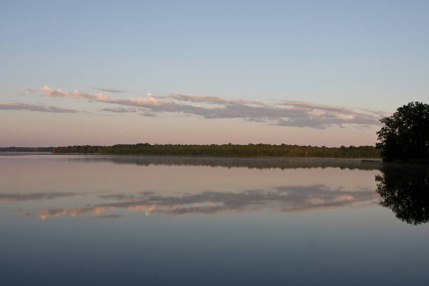 istock Sunrise on Peaceful Lake 147656693