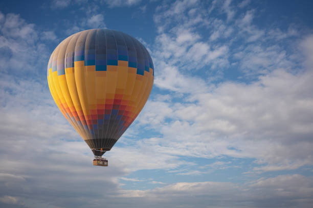 Free Stock Photo of Large Hot Air Balloon Flying Through Blue Sky ...