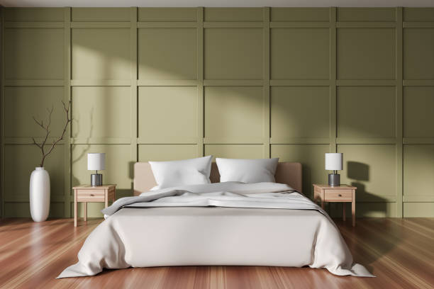 istock Green bedroom interior with bed and decor on nightstand. Empty wall 1476567100