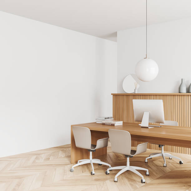 istock Corner view on bright office room interior with white wall 1476568171