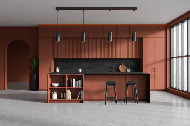 istock Brown kitchen interior with bar countertop and seats near panoramic window 1476568696