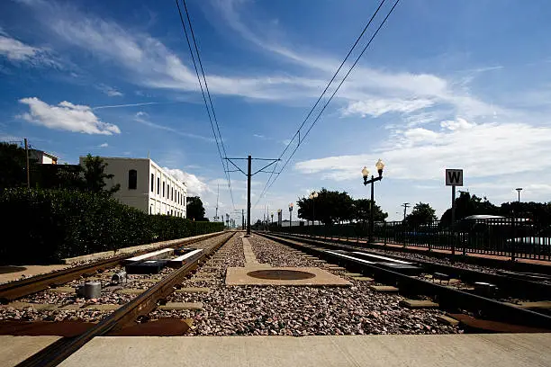 Photo of Subway Rail Tracks Disappearing into the Horizon