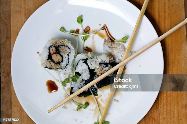 Half Eaten Sushi Roll Stock Photo - Download Image Now - Asia, Bud, Chopsticks