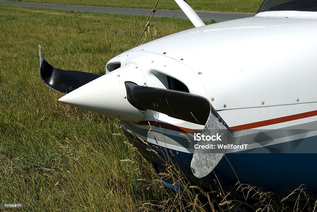 Damaged Airplane Front of a private airplane with a severely damaged propeller Airplane Stock Photo