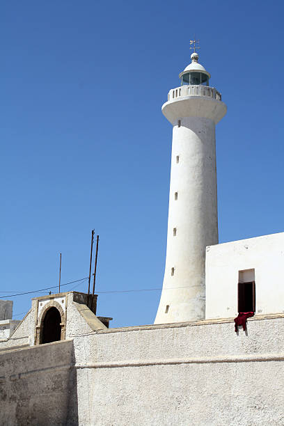 White lighthouse stock photo