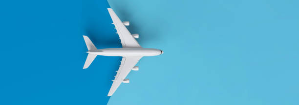 istock Travel concept with plane on blue background with copy space. 1476595097