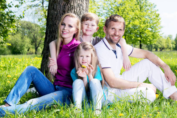 istock Family in spring park 1476595146