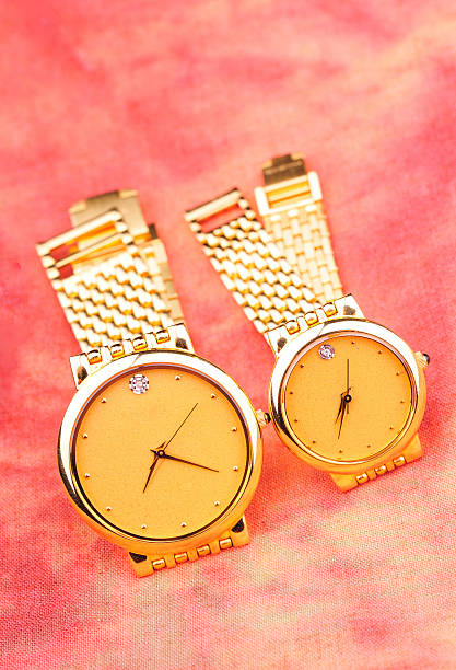 istock pair of gold watches 147659614