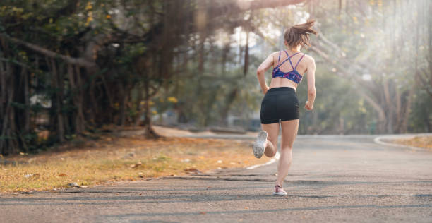 istock Young woman runner running in the park. 1476600207