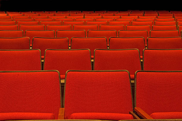 Pattern of empty red seats stock photo