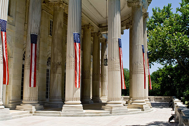 istock Narrow American Flags Hanging on Columns Building Washington DC 147660633