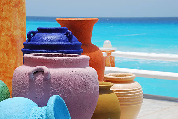 istock Colorful clay pots with blue caribbean ocean 147661027