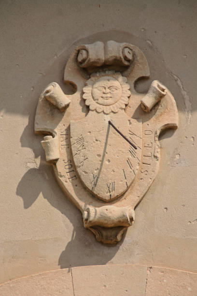 istock a sundial on a house wall 1476613440