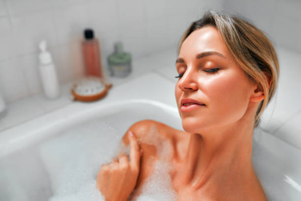 istock Woman in bathroom 1476616011