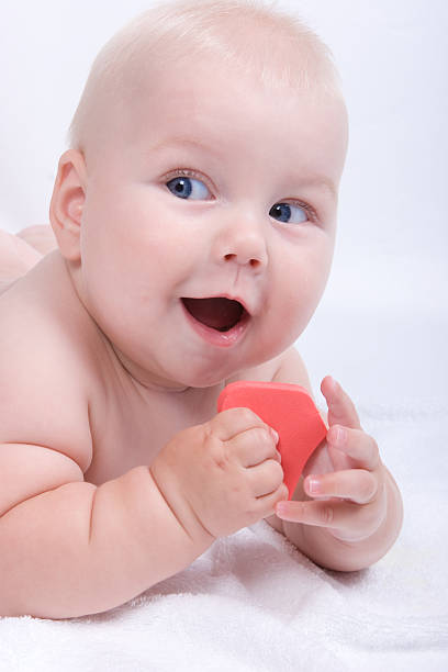 istock Smiling baby boy with bright toys 147661996