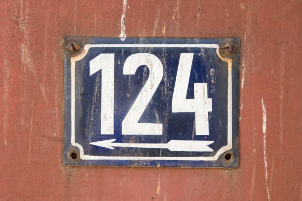 istock Weathered enameled plate number 124 1476621811