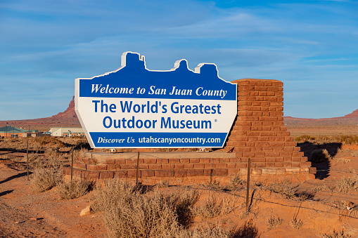 Monument Valley, United States - November 21, 2022: A picture of the San Juan County sign on the border between Arizona and Utah.