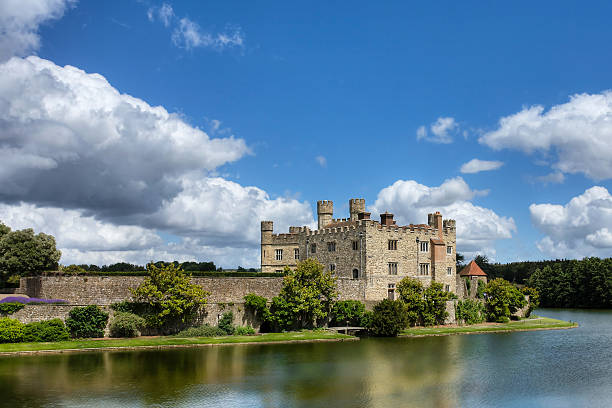 Solid magnificent castle of Leeds along riverside Leeds Castle in Kent, UK  kent england photos stock pictures, royalty-free photos & images
