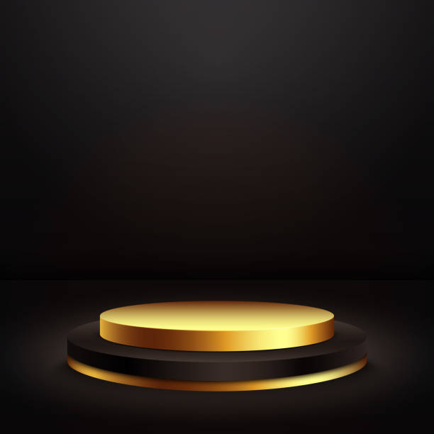 istock Luxurious black and gold cylindrical podium with a dark empty room. Room with a minimal stage. 1476642149