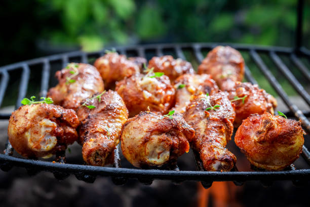 istock Hot grilled chicken leg marinated with honey and spices. 1476658197