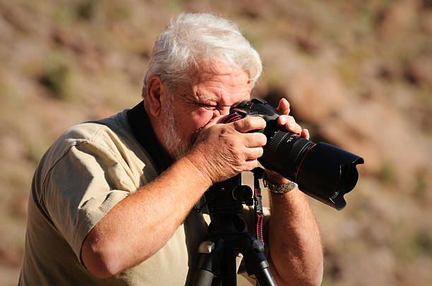 istock Senior Citizen Photographer Taking Pictures 147666062