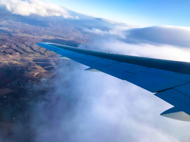 istock Sky and land seen from an airplane 1476665121
