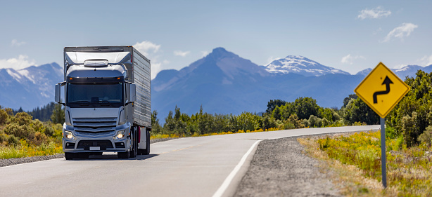 Truck driving on lonely road in Patagonia South America