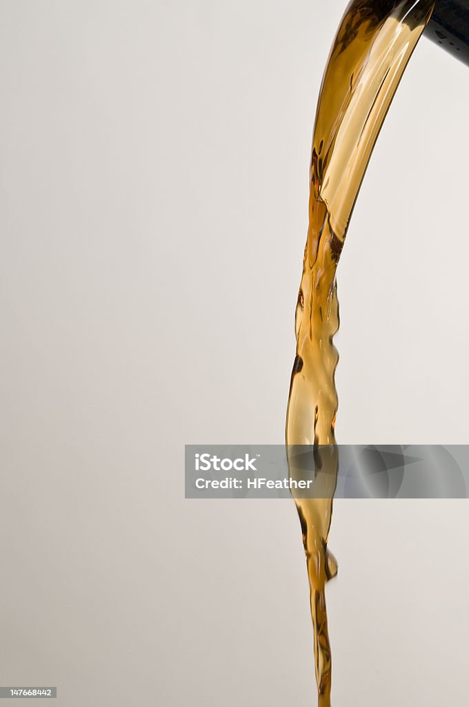 C for Cola pouring out of a container. Activity Stock Photo