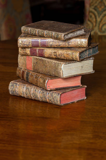 istock Antique books on a wooden table 1476684453