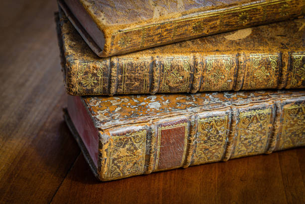 istock Antique books on a wooden table 1476685001