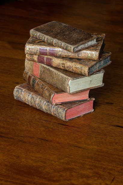 istock Antique books on a wooden table 1476685031