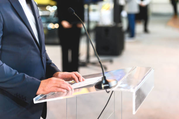 Speaking publicly from the lectern stock photo