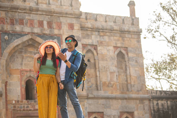 istock Couple having fun admiring view at historic site 1476692520