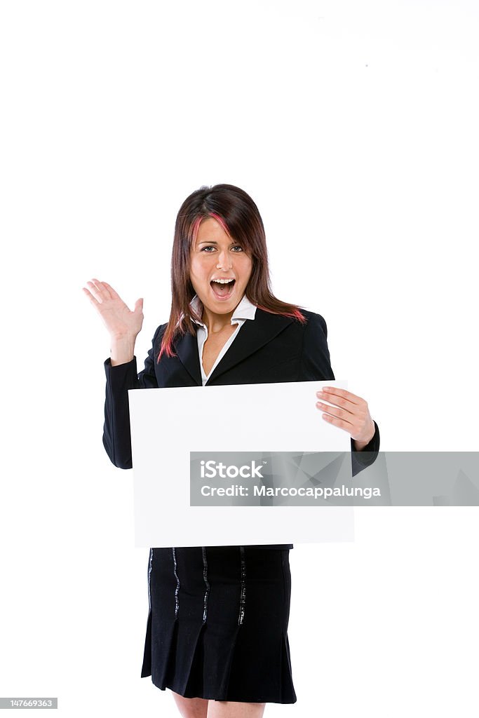 Sorpresa donna con un cartello bianco vuoto pannello - Foto stock royalty-free di Abbigliamento da lavoro