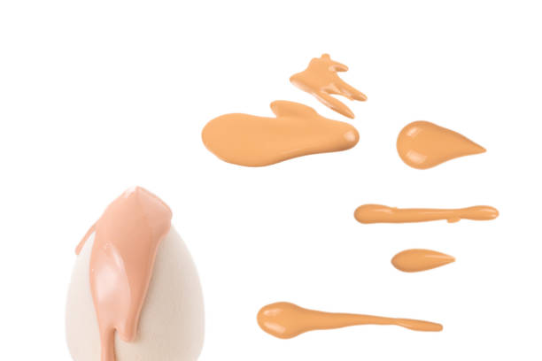 istock Liquid foundation swatch isolated on white background. Close Up of makeup cream sample. 1476694234