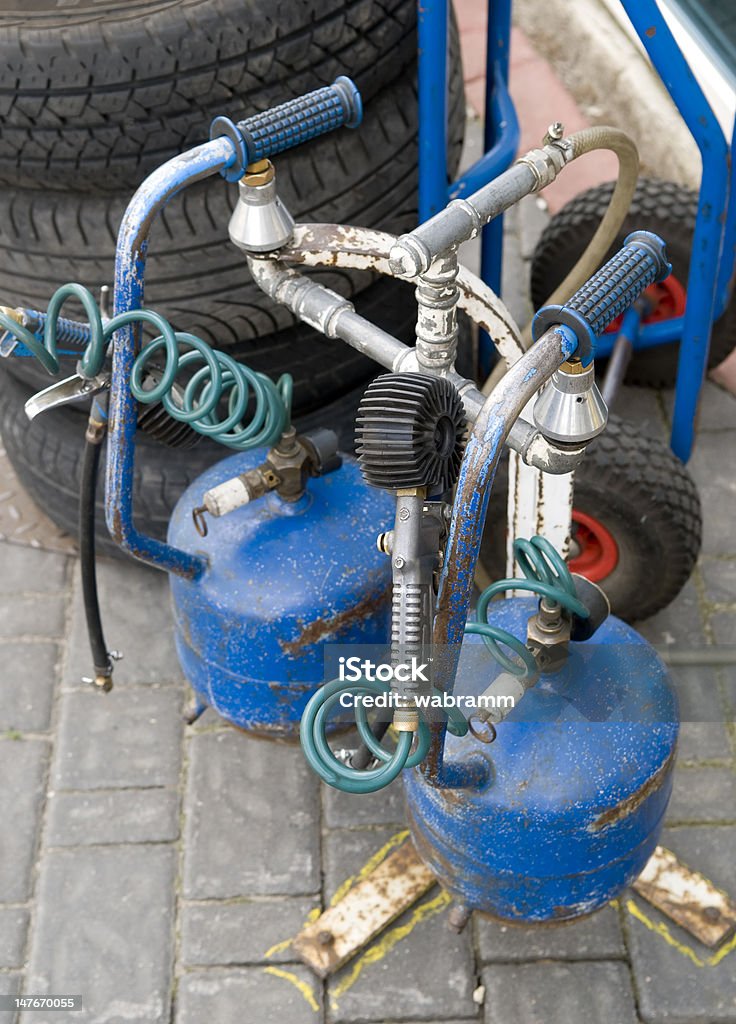 Reparación de rueda - Foto de stock de Azul libre de derechos
